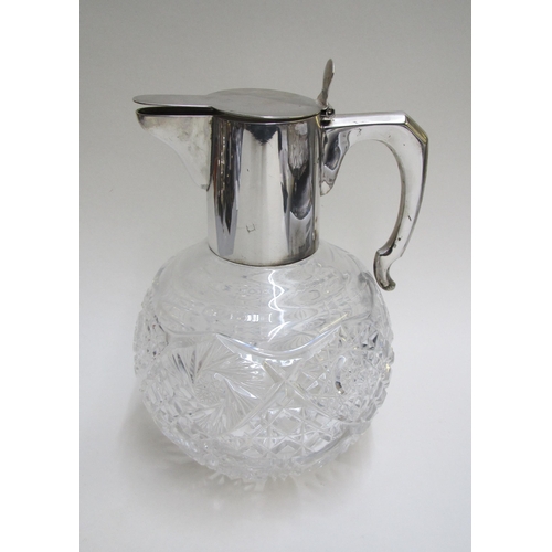 231 - A Continental silver mounted and cut crystal claret jug