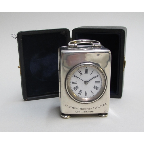 235 - A miniature silver carriage clock