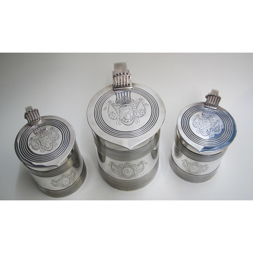 239 - Three William IV silver armorial tankards