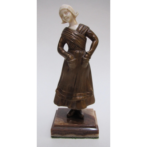 248 - An Art Deco cold painted bronze and ivory figure of a Dutch girl