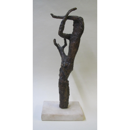 515 - A bronze model in the form of a figure