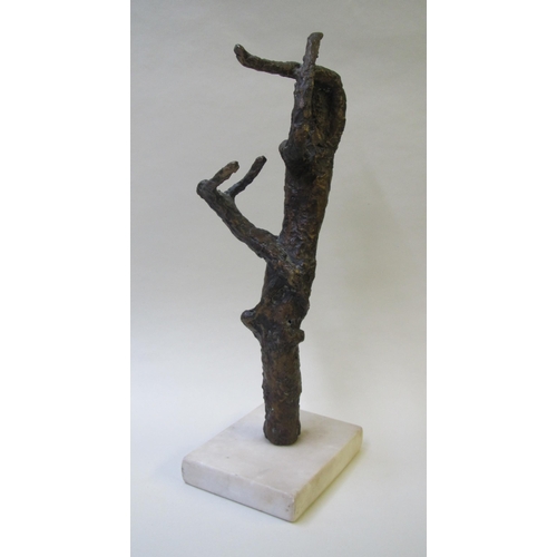 515 - A bronze model in the form of a figure