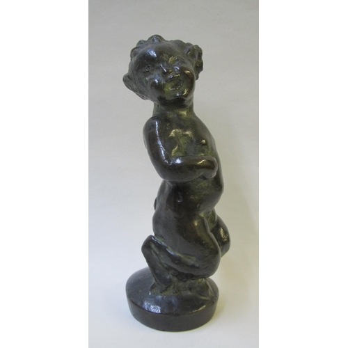 517 - A bronze model of a faun