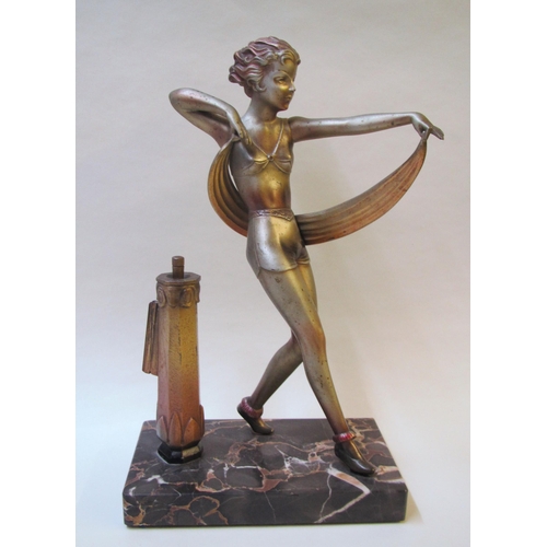 518 - An Art Deco spelter lighter