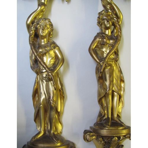 520 - A pair of gilt wood appliques