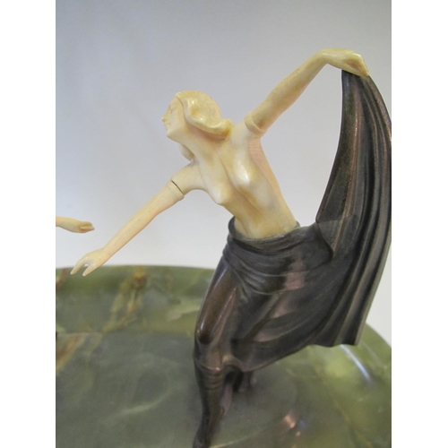 522 - An Art Deco gold painted bronze and ivory model