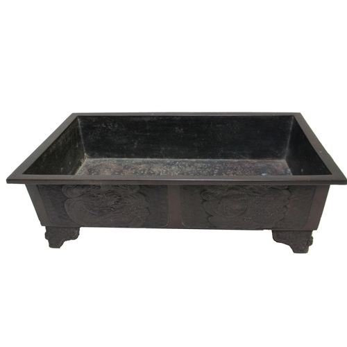 665 - A Chinese bronze rectangular two handled planter