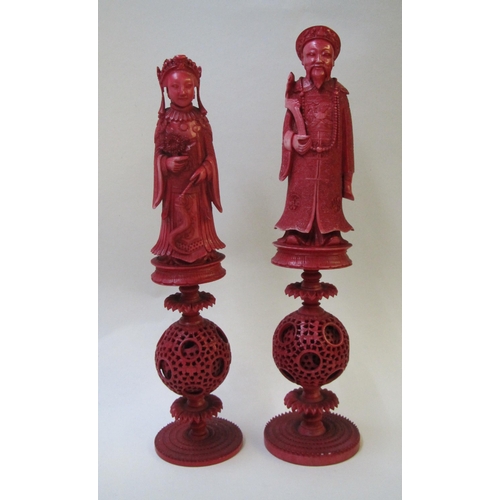 666 - A pair of Chinese export ivory red stained King and Queen chess pieces