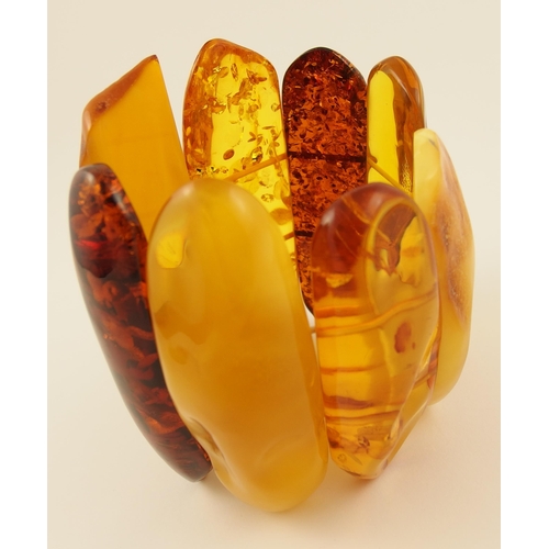 101 - Item 6. A very large yellow and orange amber coloured statement bracelet