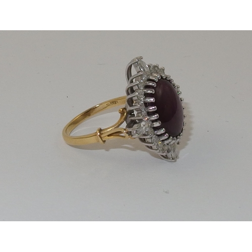 117 - A substantial 18ct gold star ruby and diamond ring