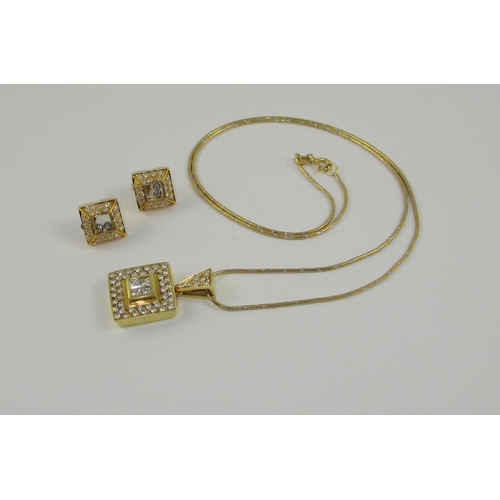 148 - A square diamond set pendant with matching earrings