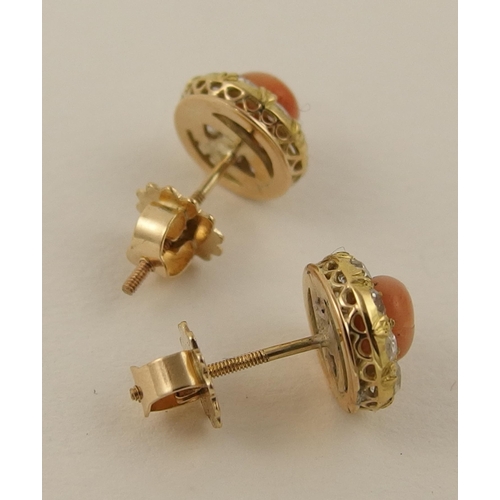 150 - A pair of coral and diamond earrings