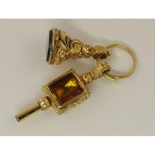 154 - A yellow metal watch key