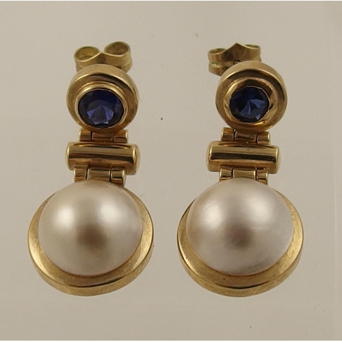 170A - A pair of 9ct blue gem stone and mabe pearl earrings