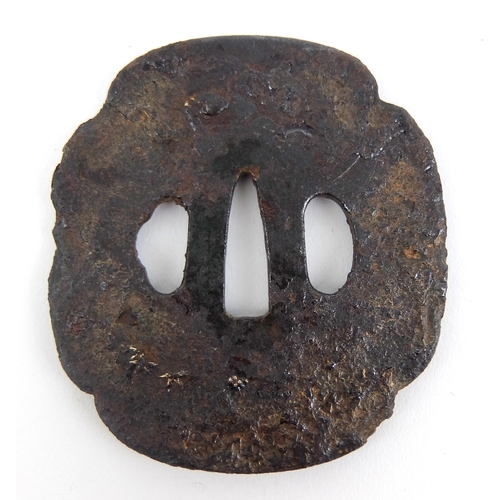 238 - A Japanese cast iron Tsuba