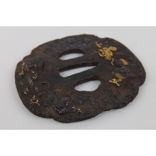 238 - A Japanese cast iron Tsuba