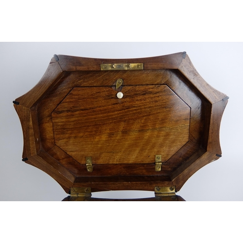 292 - A Victorian walnut hexagonal shaped tea caddy