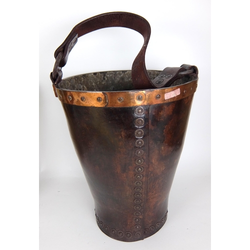 309 - Two 19th Century leather fire buckets