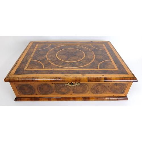 315 - A walnut oyster veneered rectangular dressing table box in the 17th Century style