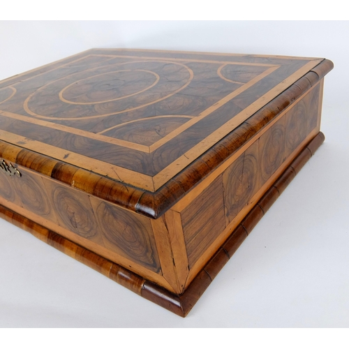 315 - A walnut oyster veneered rectangular dressing table box in the 17th Century style