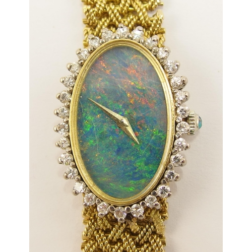 64 - An 18ct opal faced ladies Chopard watch