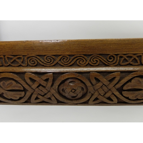 702 - Manner of ALEXANDER RITCHIE an elaborately carved oak picture frame