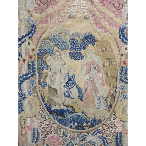 703 - An 18th Century silk and woolwork panel of The Holy Family