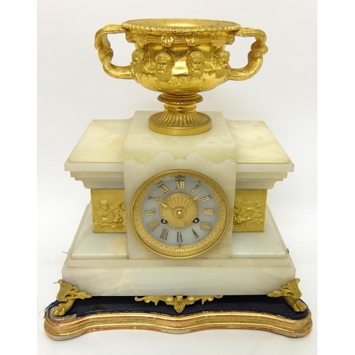 707 - A Japy Freres onyx and gilt metal mantle clock garniture