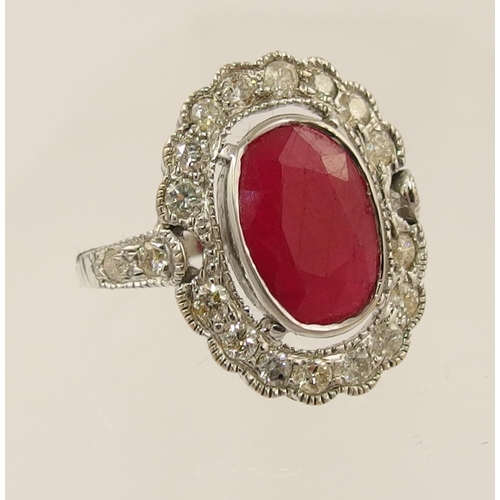 79 - A 14ct diamond and ruby ring