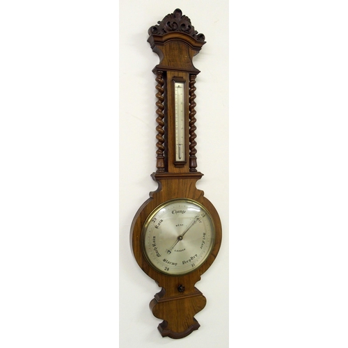 832 - A Victorian carved walnut banjo wall barometer