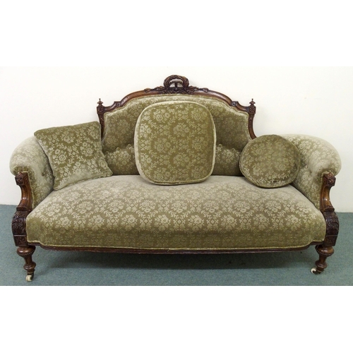 836 - A Victorian carved walnut settee