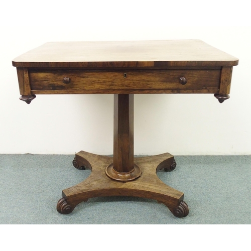 864 - A William IV rosewood writing table