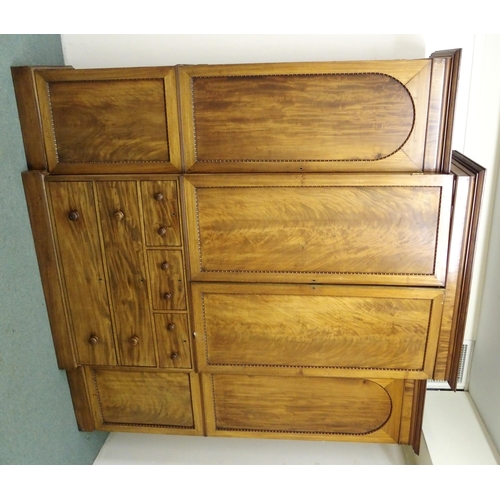 880 - A Victorian mahogany combination wardrobe