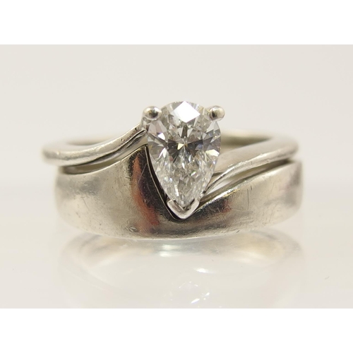 95 - A pear shaped diamond ring