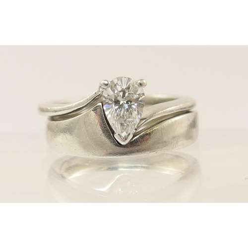 95 - A pear shaped diamond ring