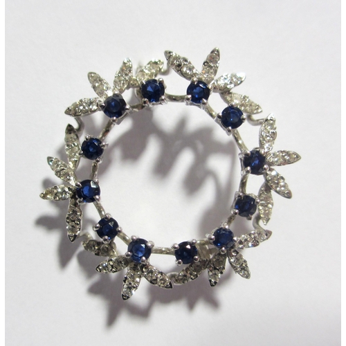 101 - A sapphire and diamond brooch