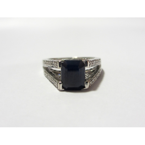 102 - A sapphire and diamond ring