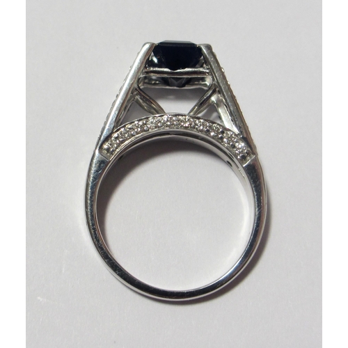 102 - A sapphire and diamond ring