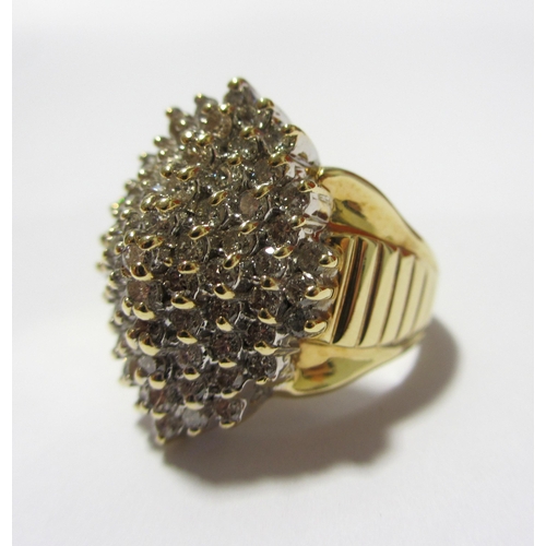 106 - A large contemporary diamond cluster dress ring