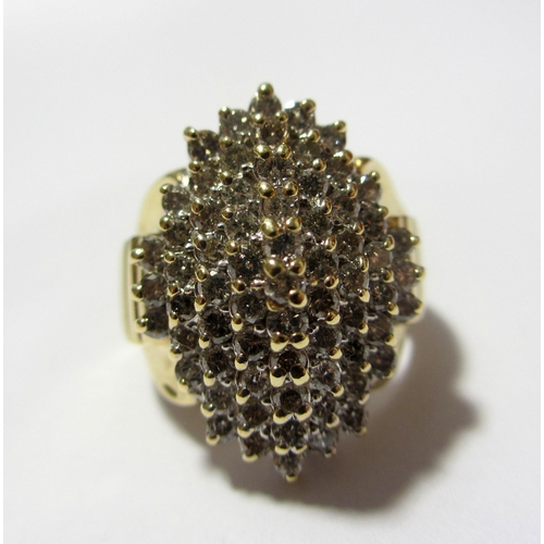 106 - A large contemporary diamond cluster dress ring