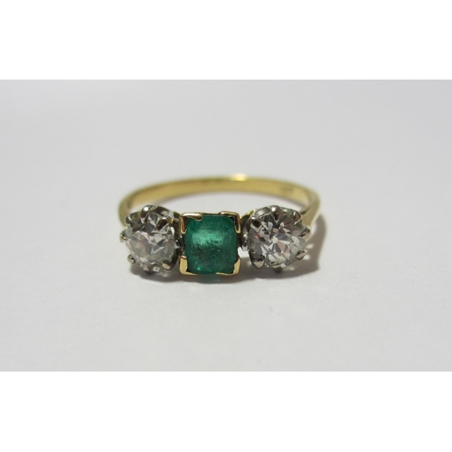 108 - An emerald and diamond ring