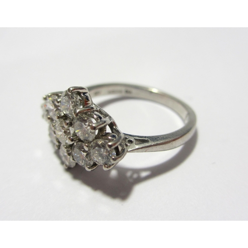 112 - A good platinum and diamond cluster ring