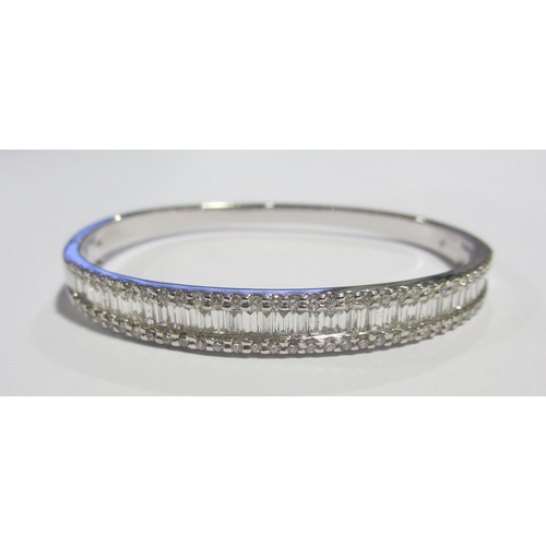 115 - A fine white gold diamond bangle