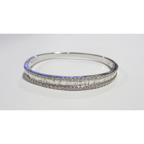 115 - A fine white gold diamond bangle