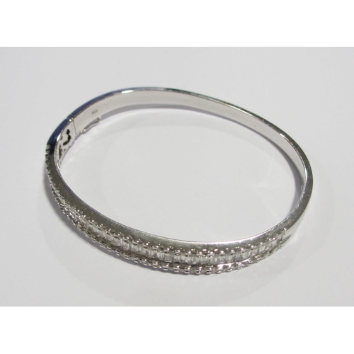 115 - A fine white gold diamond bangle