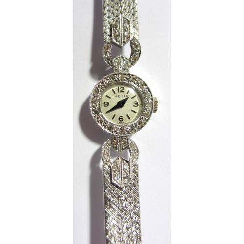 122A - A lady's diamond wrist watch by Hefik