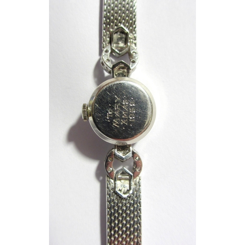 122A - A lady's diamond wrist watch by Hefik