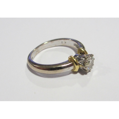 131 - A diamond solitaire ring