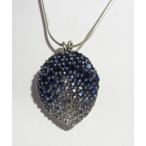 132 - A contemporary design sapphire and diamond pendant brooch