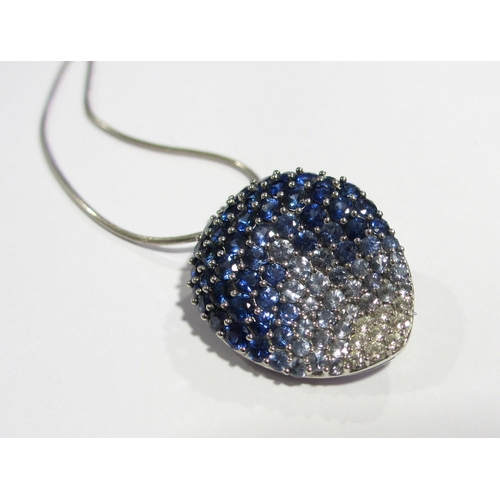 132 - A contemporary design sapphire and diamond pendant brooch